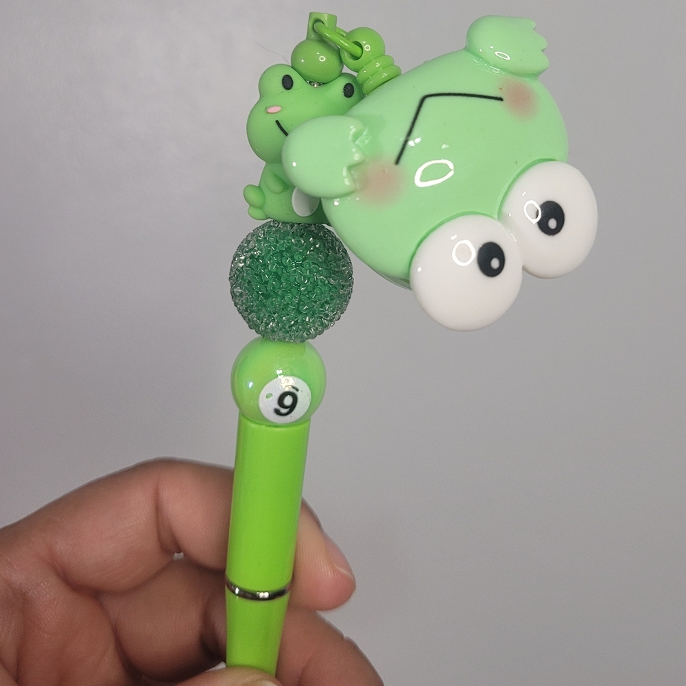 Green frog pen. Homemade and with a clip so you don't lose it.